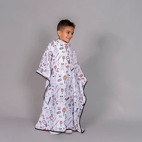 CAPA DE PELUQUERIA INFANTIL ESTAMPADA