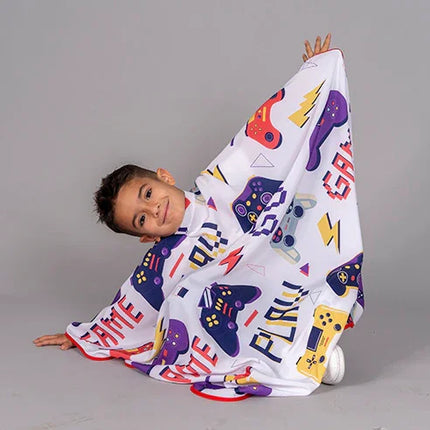 CAPA DE PELUQUERIA INFANTIL ESTAMPADA